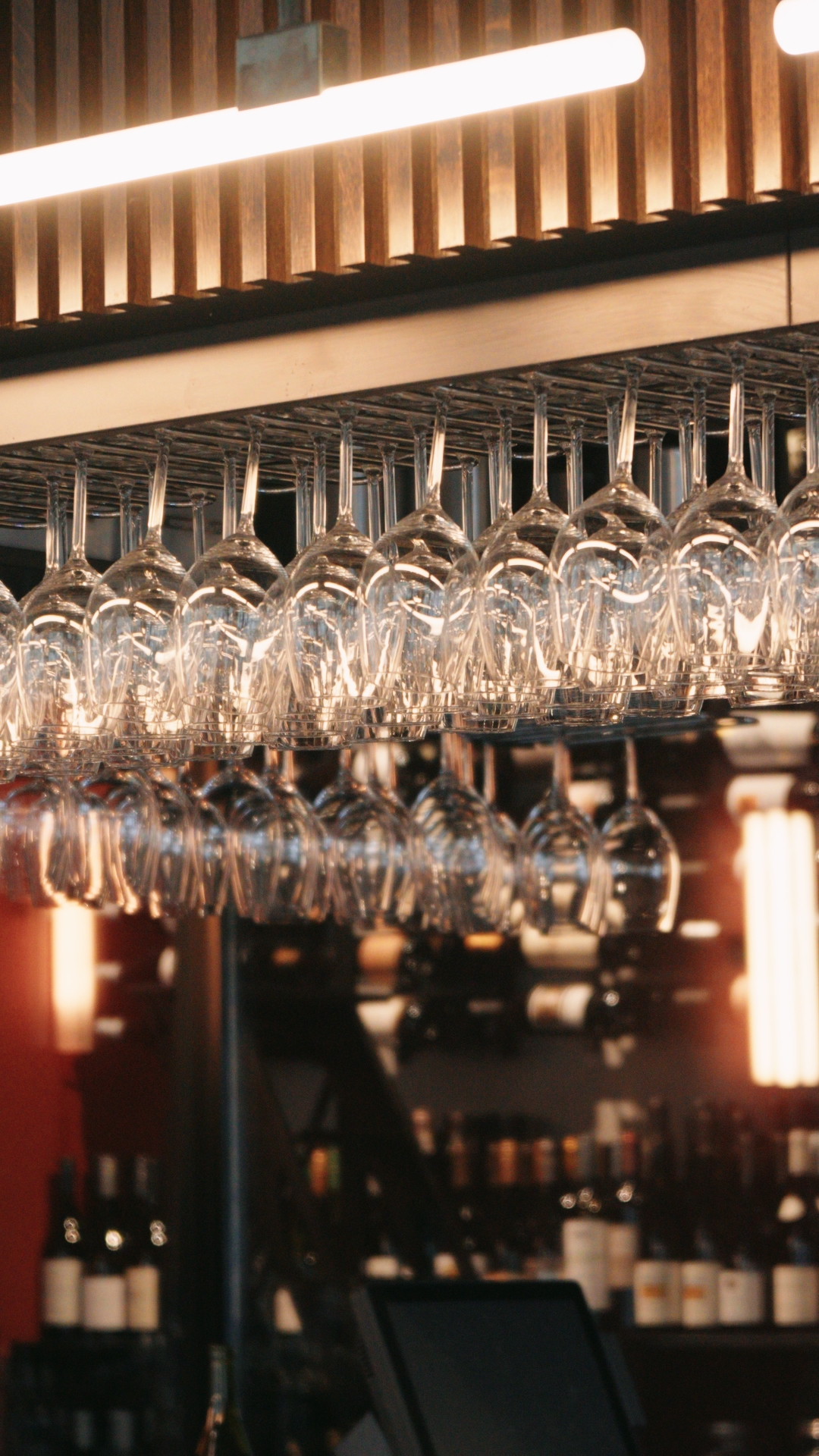 Restaurant bar seating area with warm ambient lighting