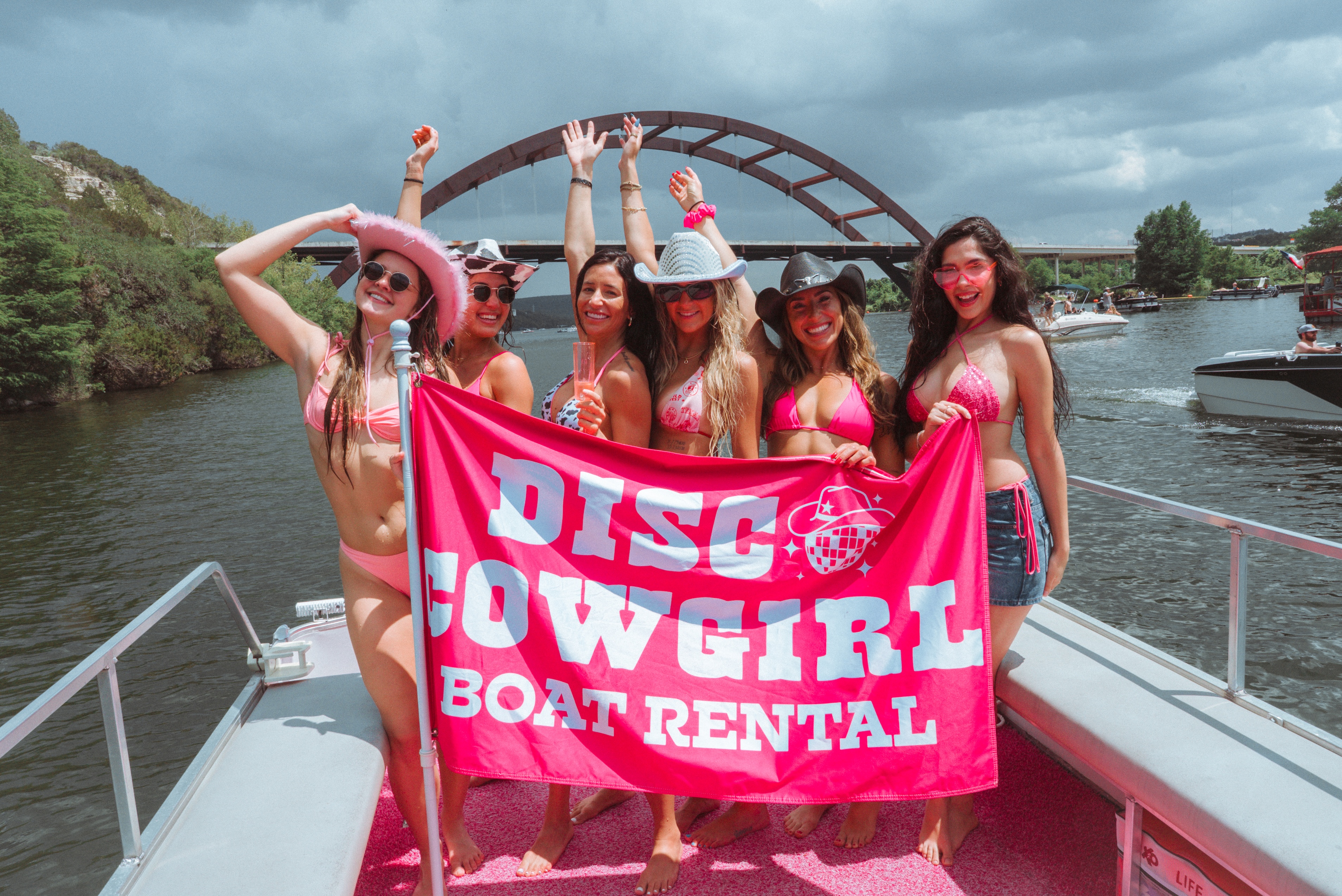 Disco Cowgirl Is the Pinkest, Loudest Party Boat on Lake Austin
