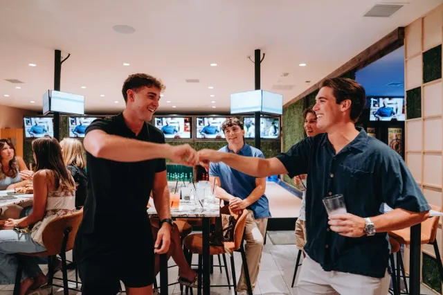 Inside House Rules, the Old Town Scottsdale Bar Where Real Ice Curling Meets Axe Throwing