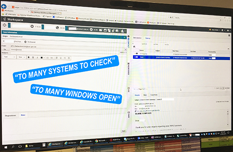 A photo of a monitor displaying a system's information about a client.