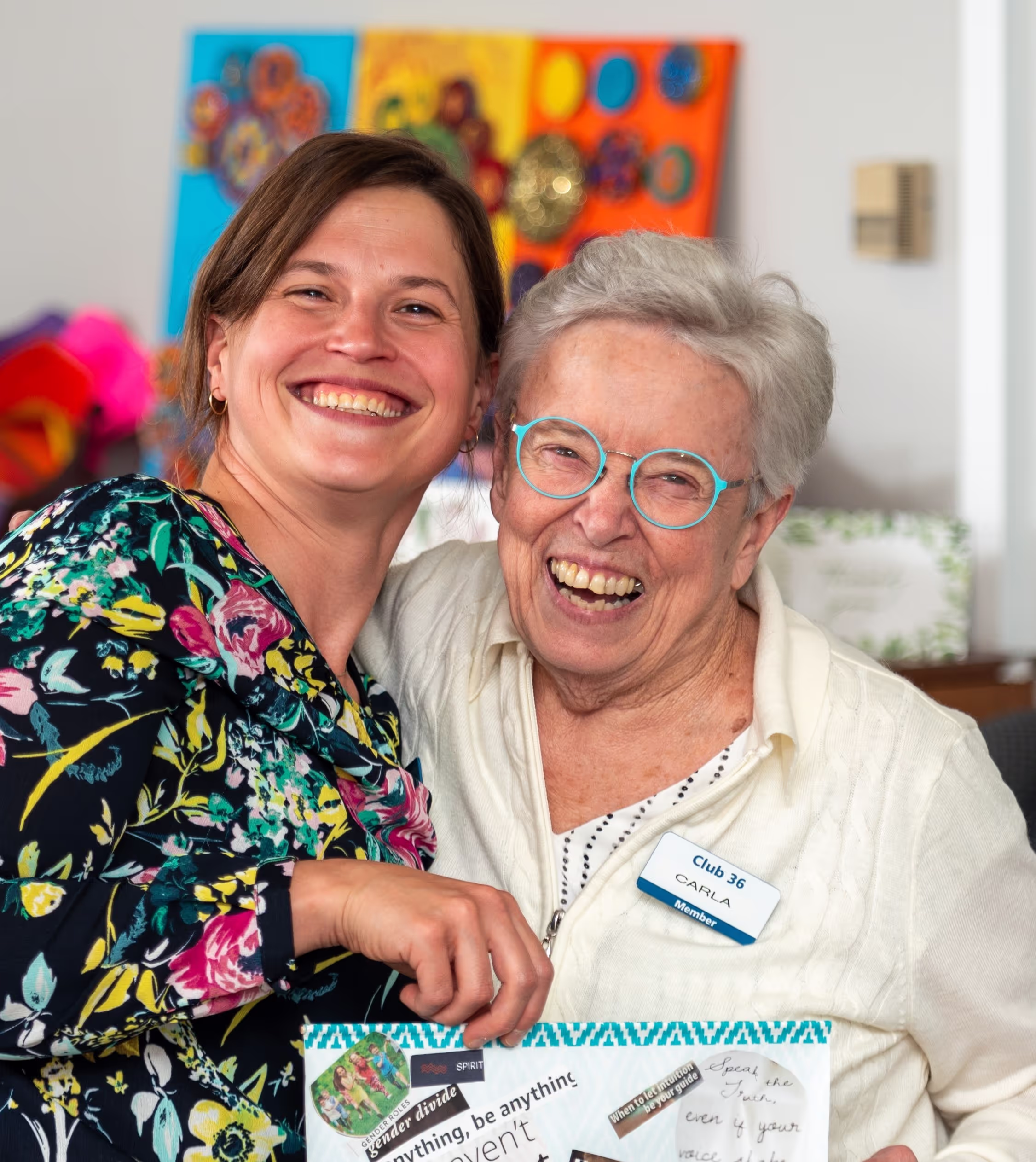 Woman wearing headphones and singing into a microphone