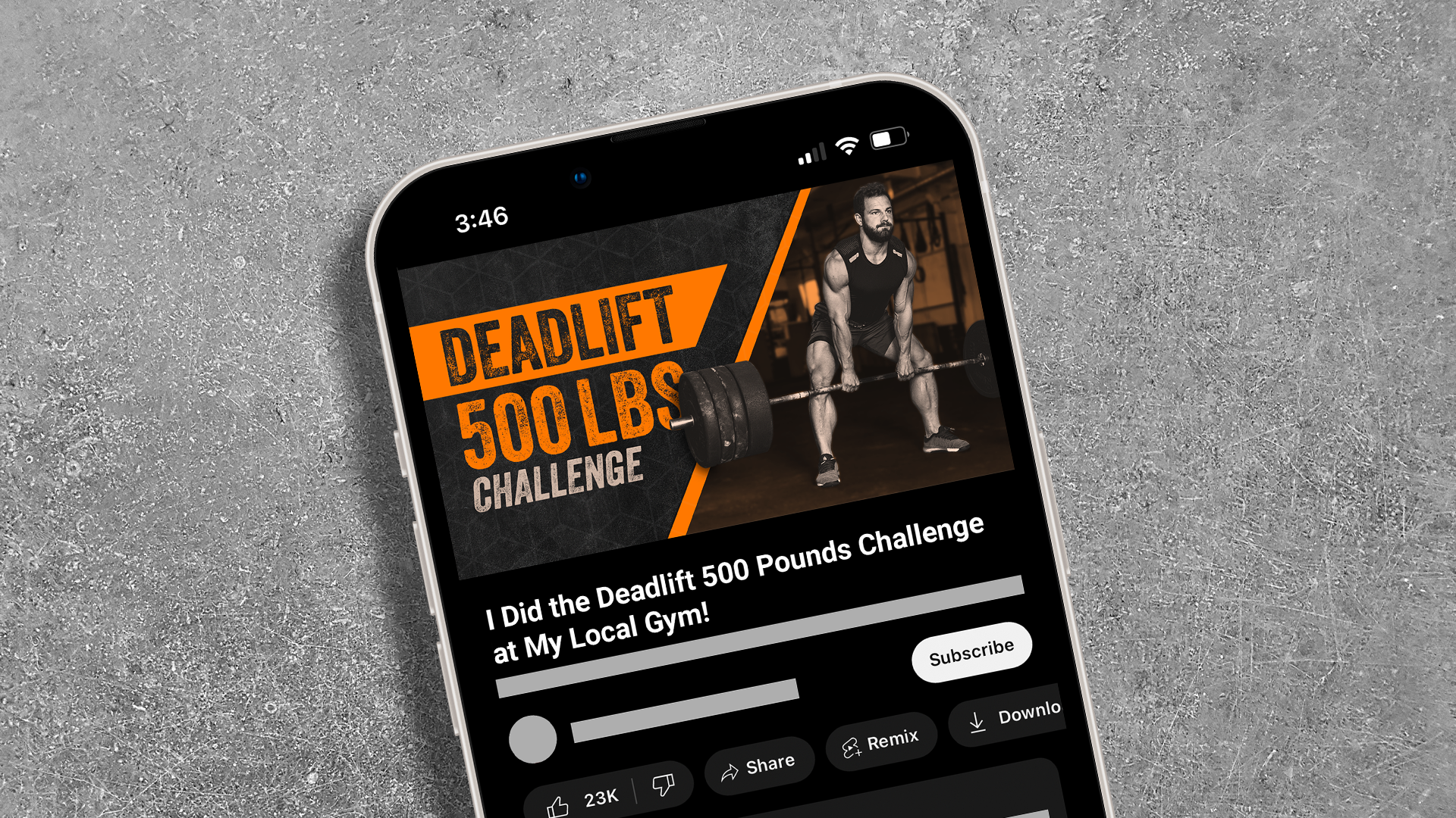 Mockup of a phone displaying the YouTube video thumbnail I designed for a video about a 500 pound deadlift challenge