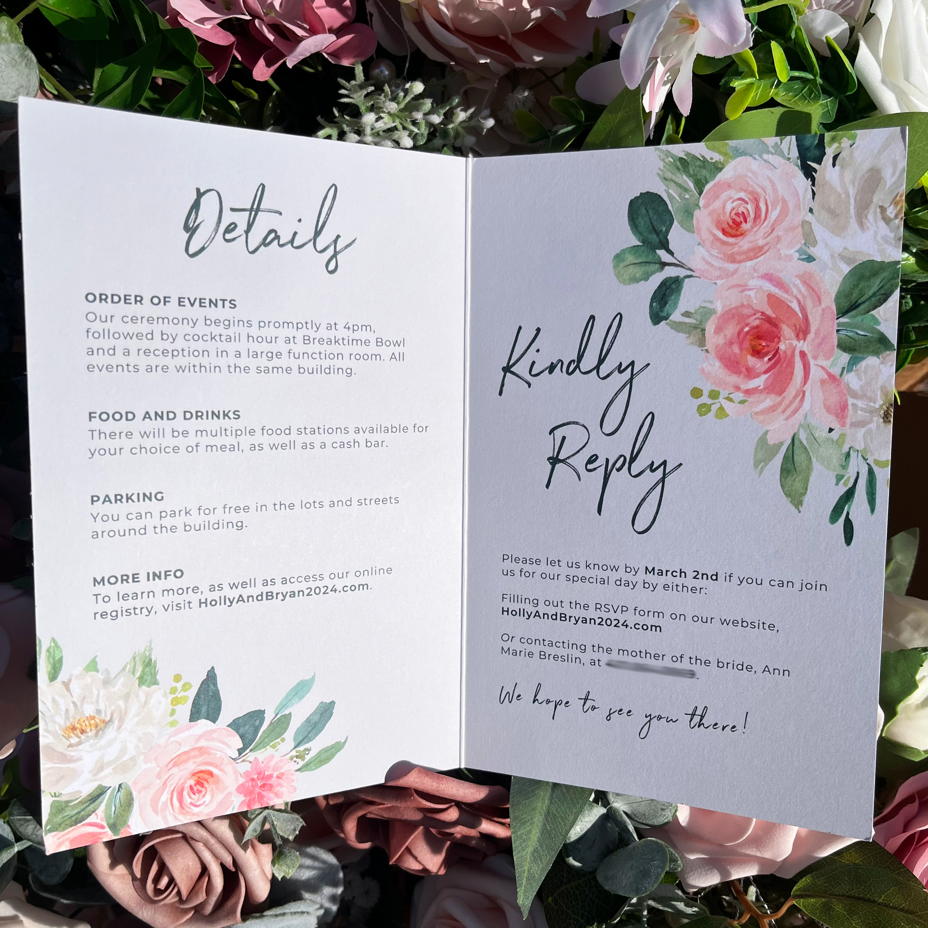 Photo of the inside pages of the wedding invitation. Features watercolor flowers in the corners and has text about the wedding details and RSVP instructions