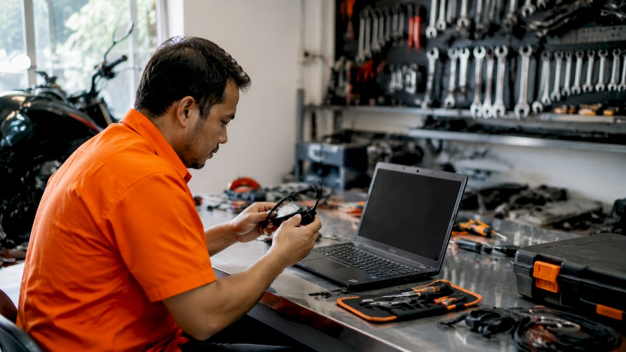 Technician performing GPS hardware pre-installation checks