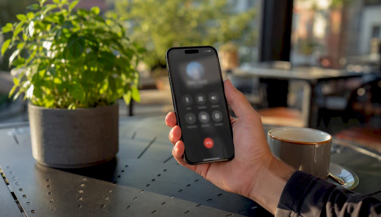 Hand dialing phone call on smartphone