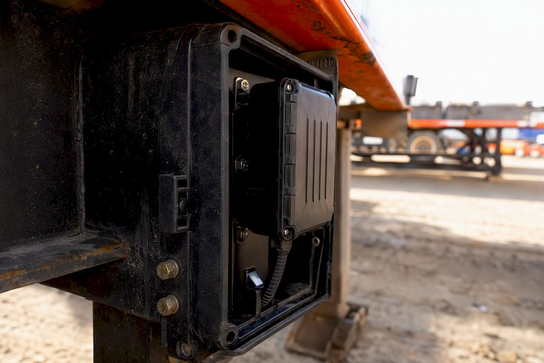 Waterproof GPS tracker sealed inside trailer frame