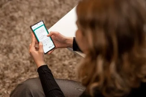 A person filling out the intake form