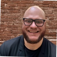 Headshot of Cal Al-Dhubaib