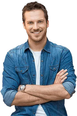 Smiling man in denim shirt with arms crossed — US Realty Training real estate student