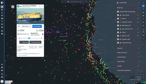 MarineTraffic map displaying GLOVIS COSMOS and color-coded vessel traffic near West Africa.