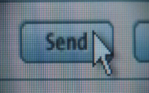 Close-up of a computer screen displaying a "Send" button with a cursor hovering over it. It switches to a woman crying. 