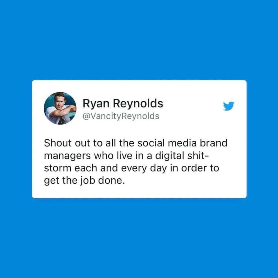 A tweet on a blue background expressing appreciation for social media brand managers working in challenging digital environments.