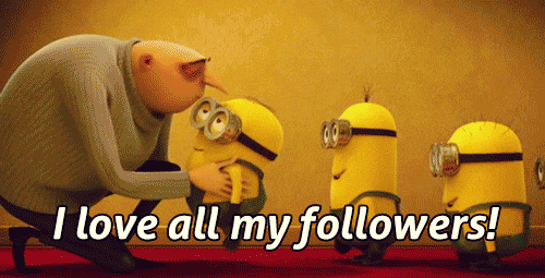 A bald figure lovingly pats a small, yellow Minion on the head while two other Minions watch with smiles. The scene has a text overlay stating, "I love all my followers!" conveying a humourous connection.