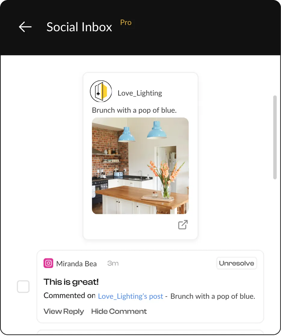 A mobile interface of 'Social Inbox Pro' displaying a post from 'Love_Lighting' titled 'Brunch with a pop of blue' featuring a kitchen with blue pendant lights over a wooden island. It shows a comment by Miranda Bea saying 'This is great!'.