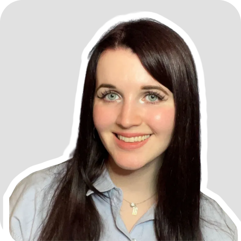 A woman with dark hair smiles. She is outlined in white with a grey background