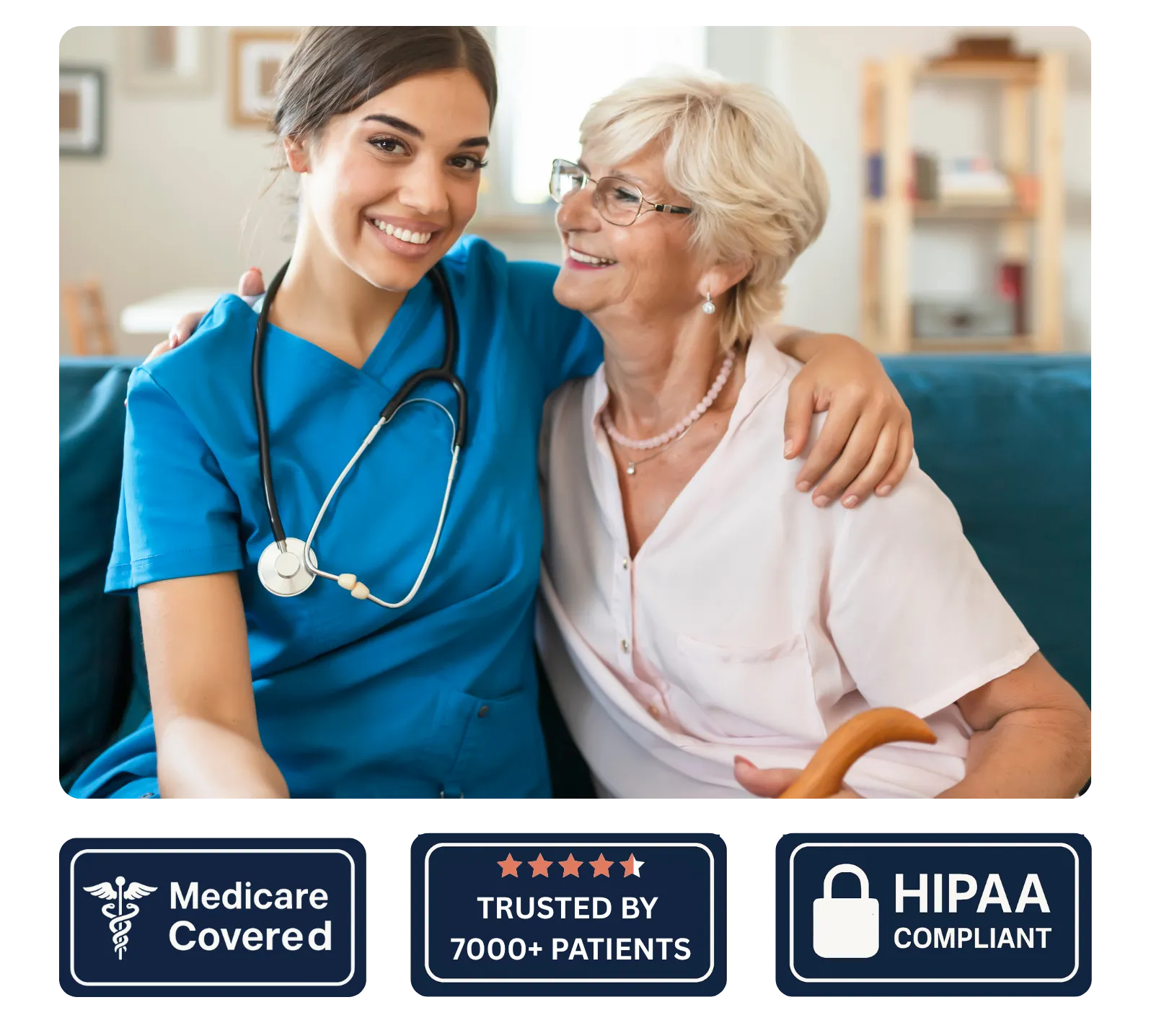 Young female healthcare worker with stethoscope hugging and smiling with elderly woman holding a cane at home.