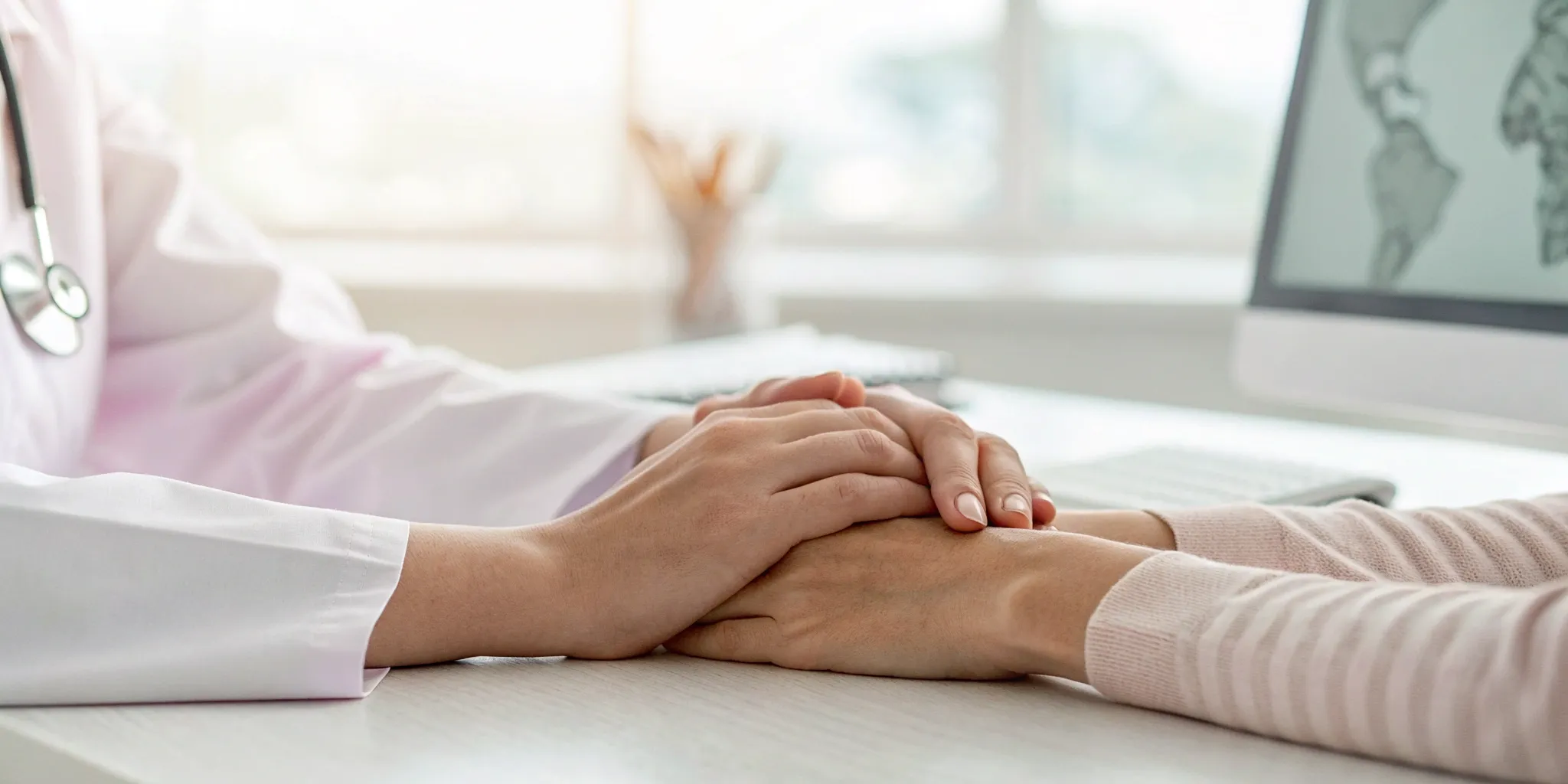 A medical professional offers support to a patient, a key role of medical advocates found by state.