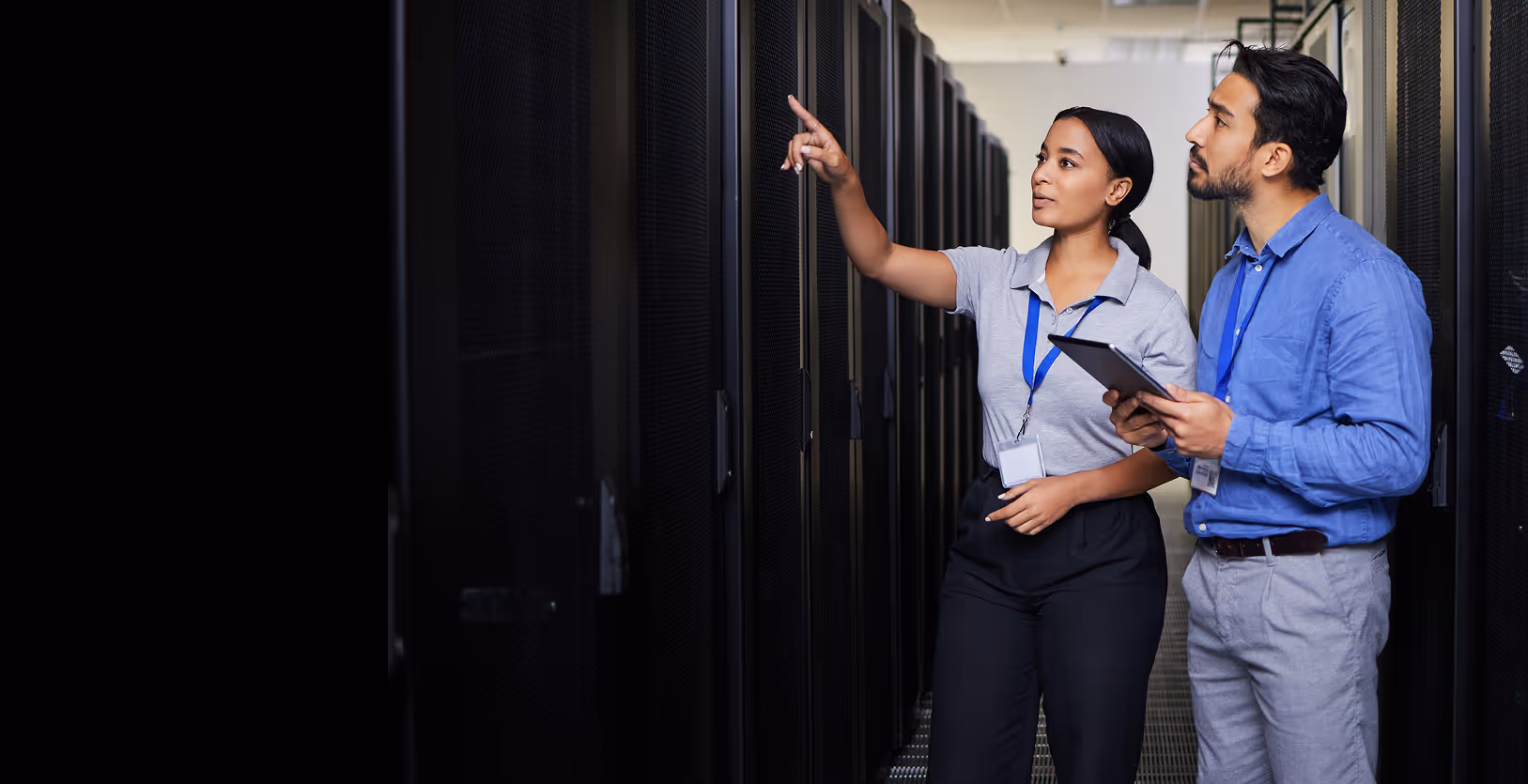 Two people in a data center