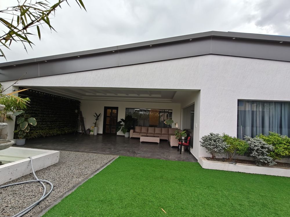 Penthouse exterior with lawn and terrace garden in North Bangalore