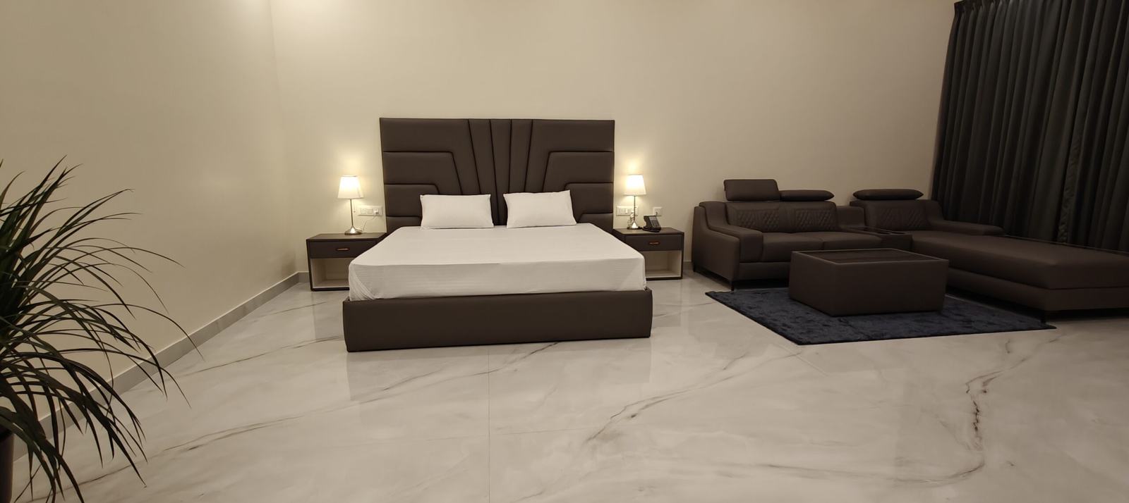 Spacious furnished hotel room with marble floor near Manyata Tech Park
