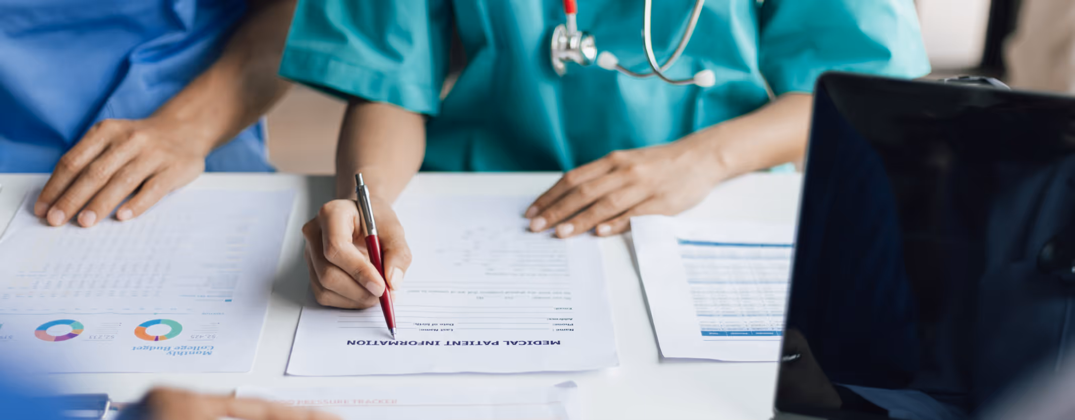 Clinical researchers documenting patient data for regenerative medicine and stem cell studies