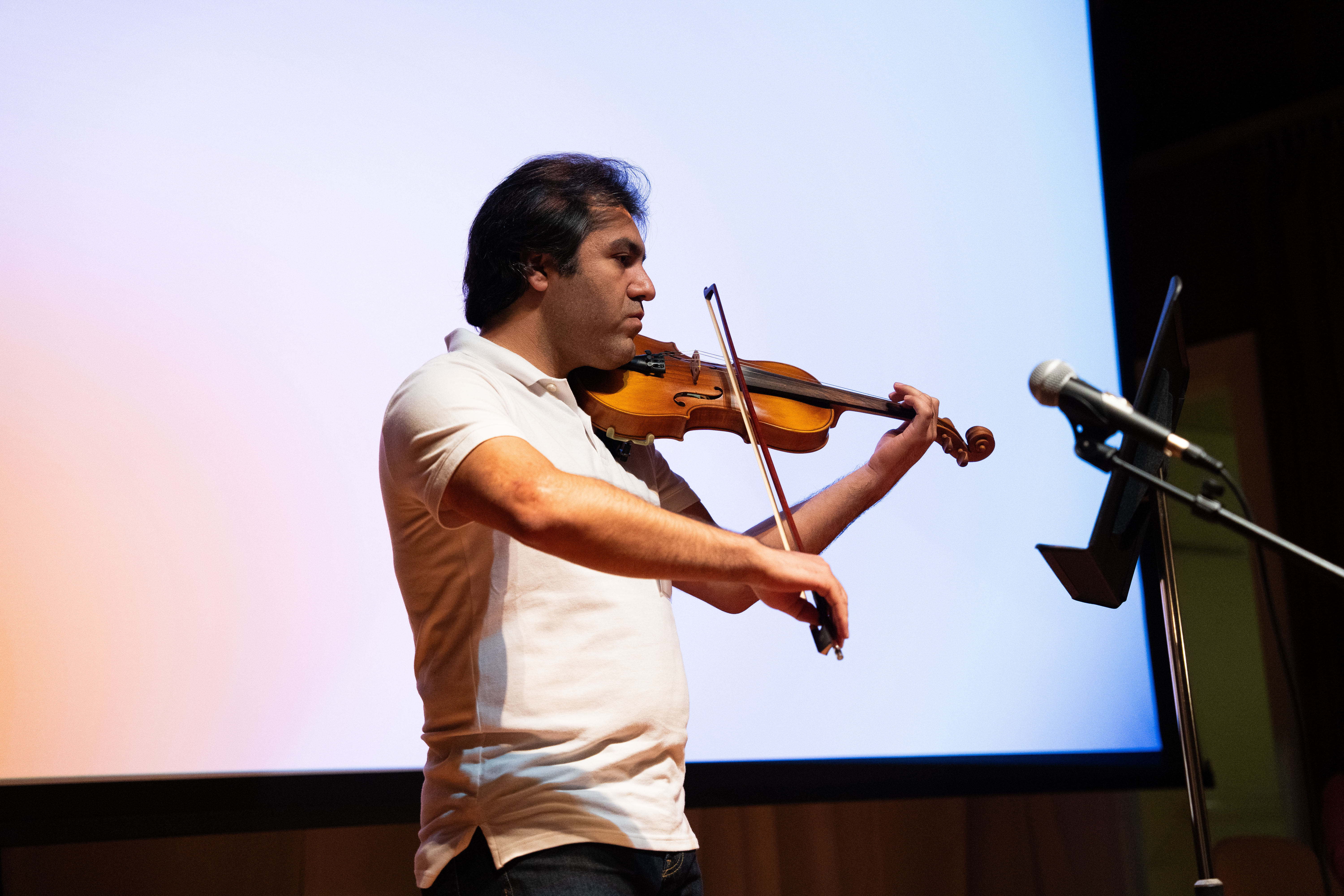 Farshid playing the Iranian violin