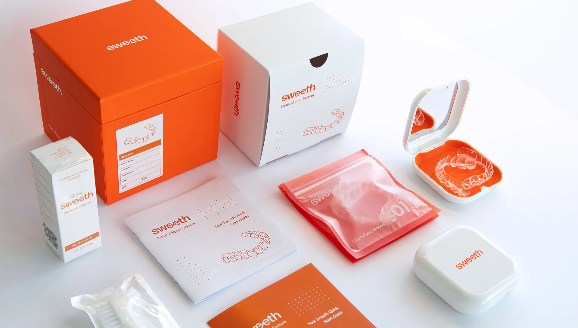 Complete Sweeth aligner packaging set including box, case, and patient accessories