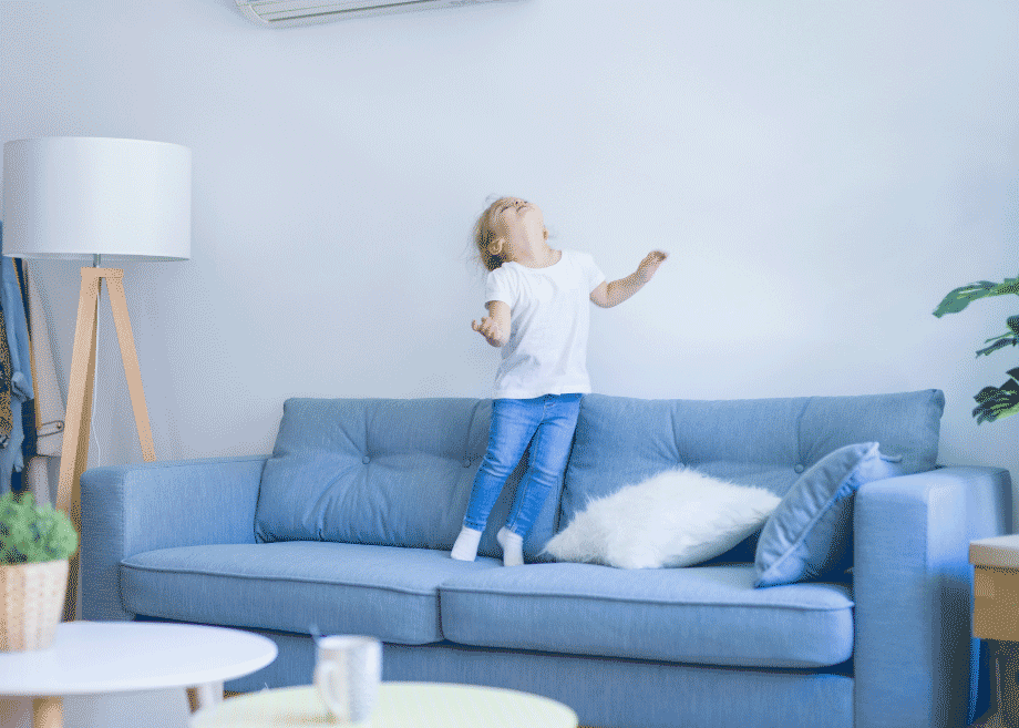 Comfortable living room with air conditioner