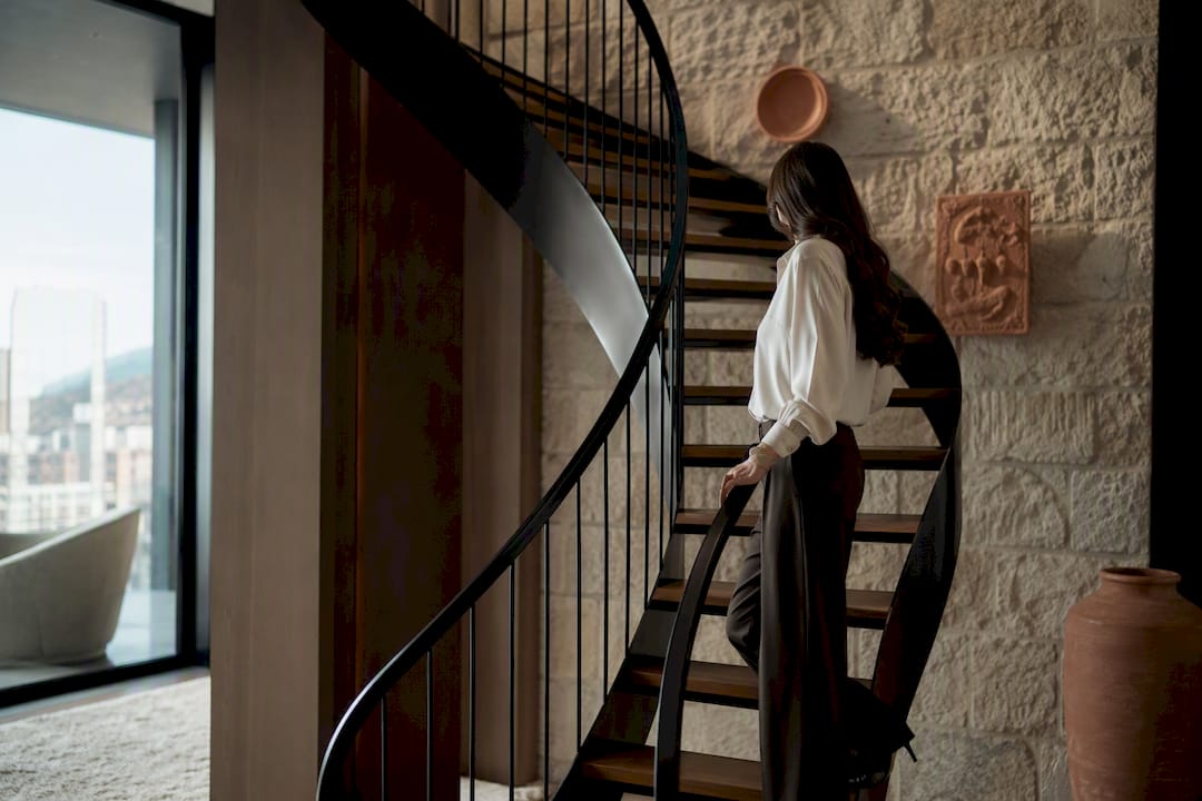 Spiral staircase detail in modern penthouse