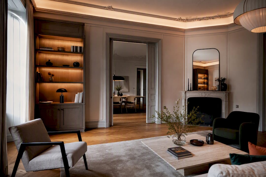 Layered lighting highlighting ornate apartment details