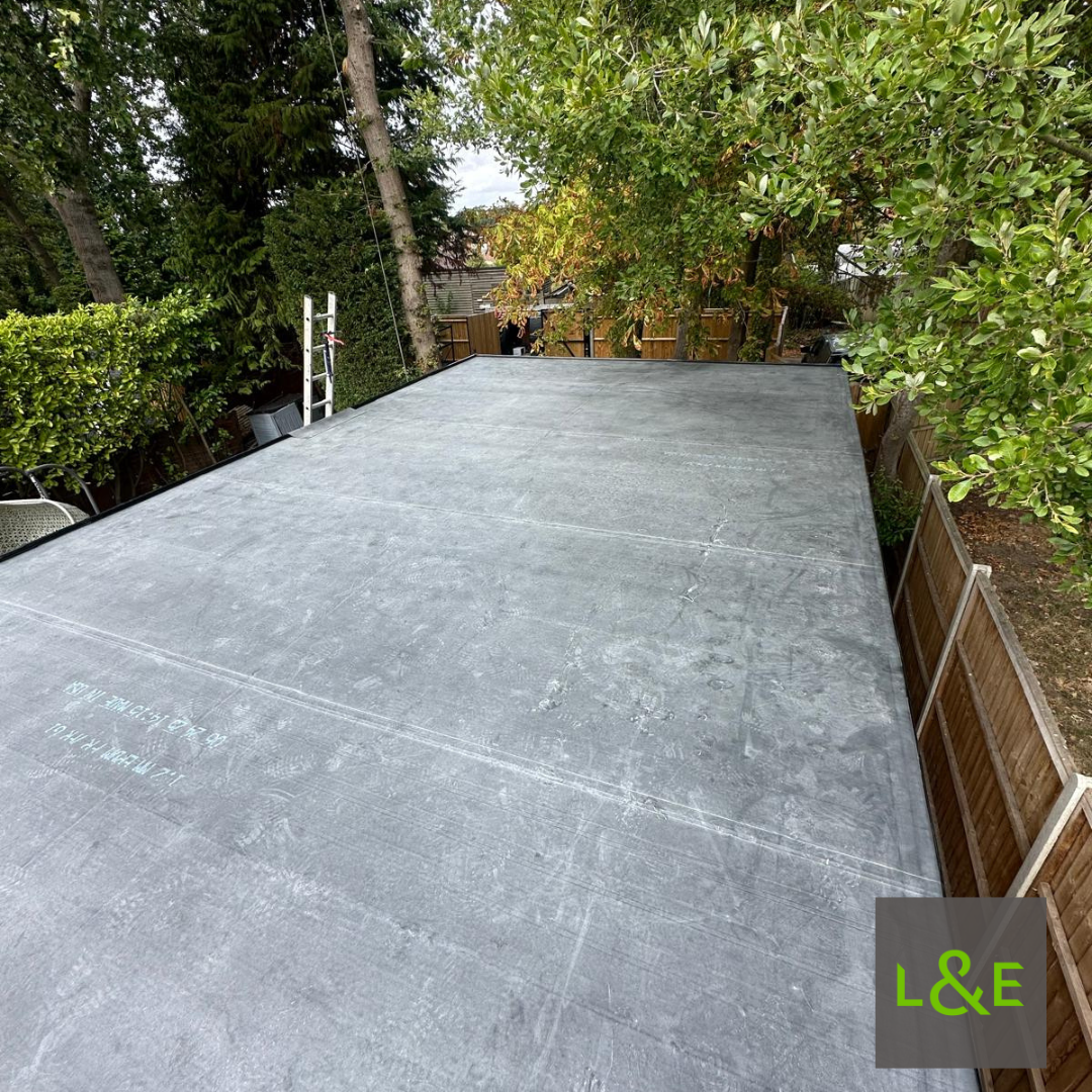 Completed EPDM flat roofing system installed on a garden room in Crowthorne, Berkshire