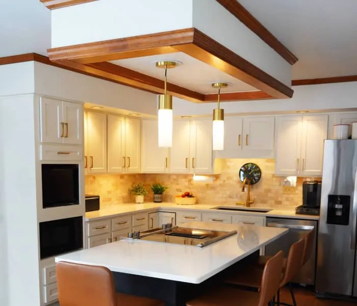 a kitchen with white cabinets