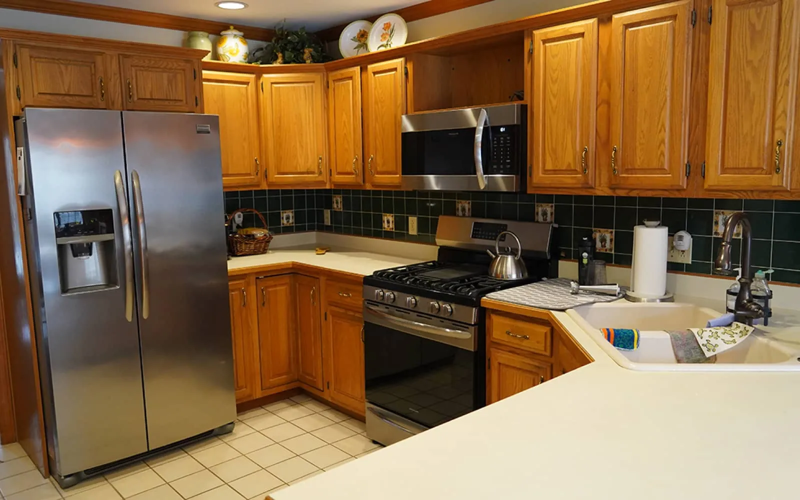 a kitchen with wooden cabinets