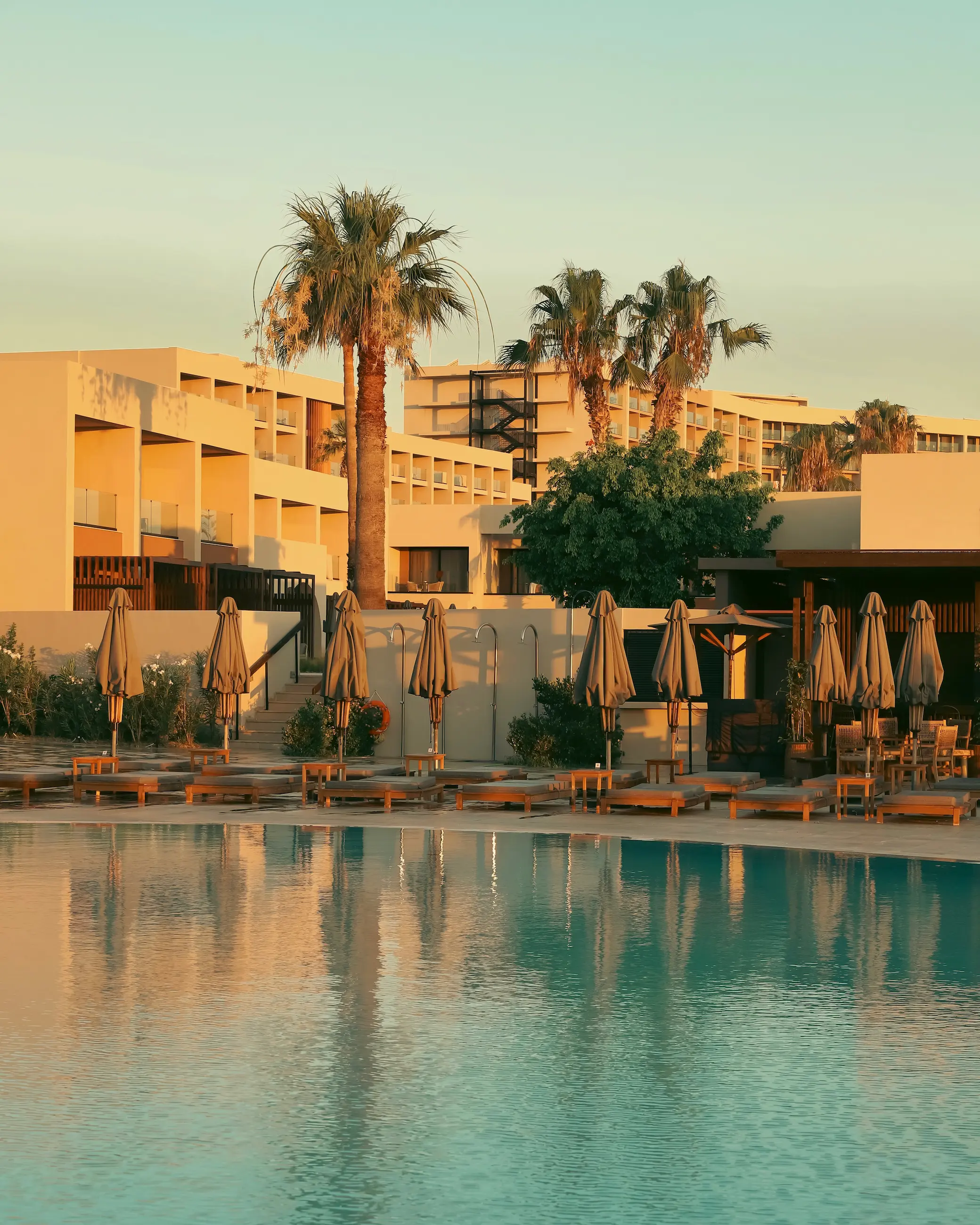 Sunset in Rhodes, Greece, at Ella Resorts over the swimming pool