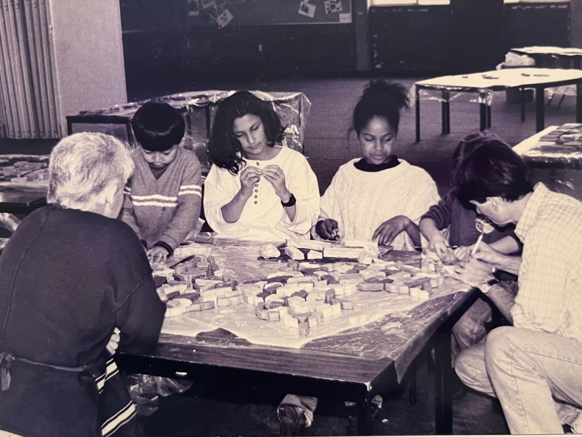 A woman picking up a brochure