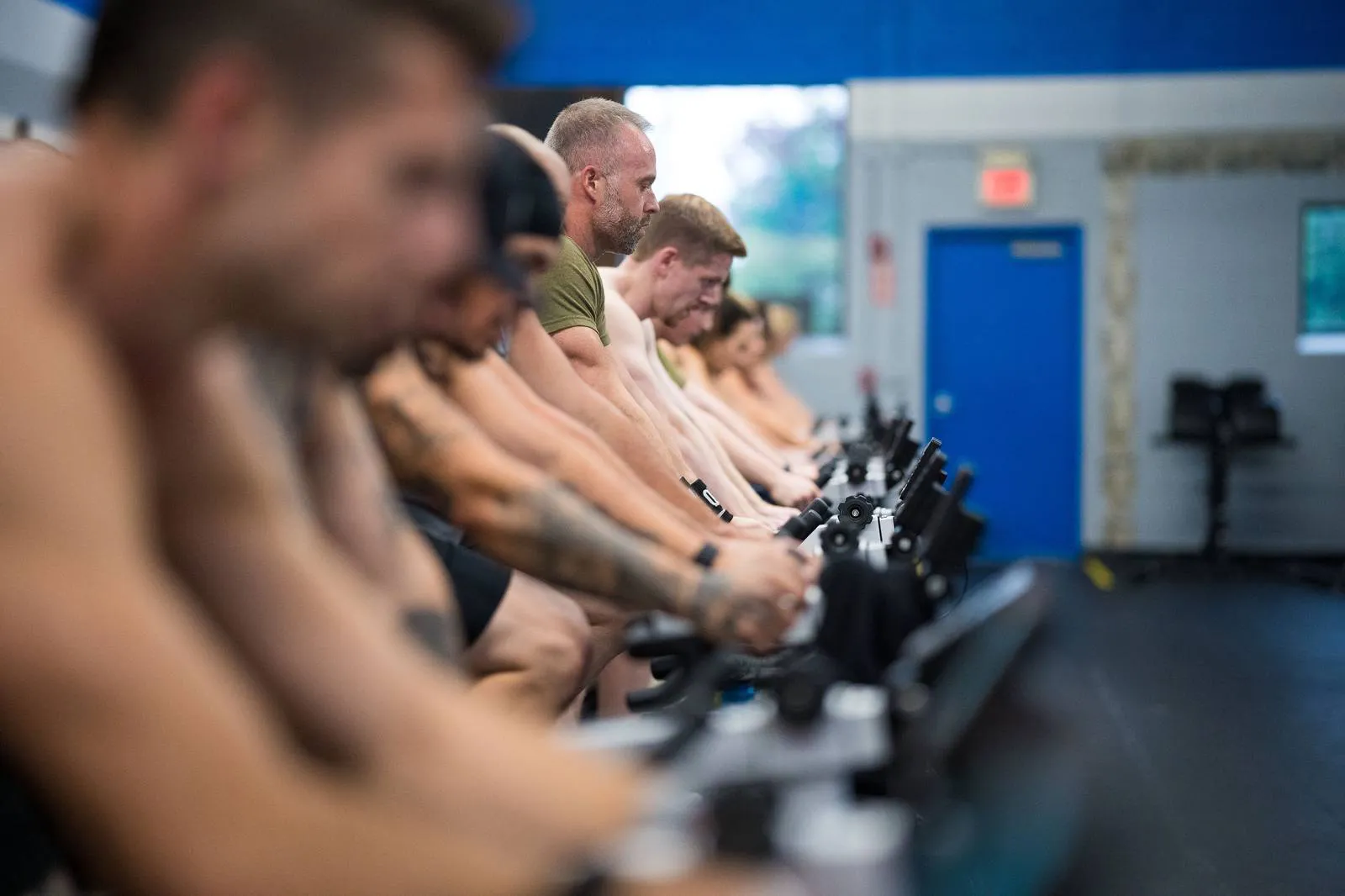 A full class working hard on bikes