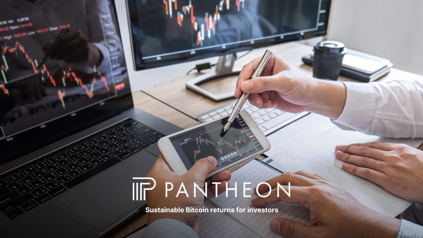 Investors reviewing Bitcoin performance charts on multiple screens, Pantheon branding visible.