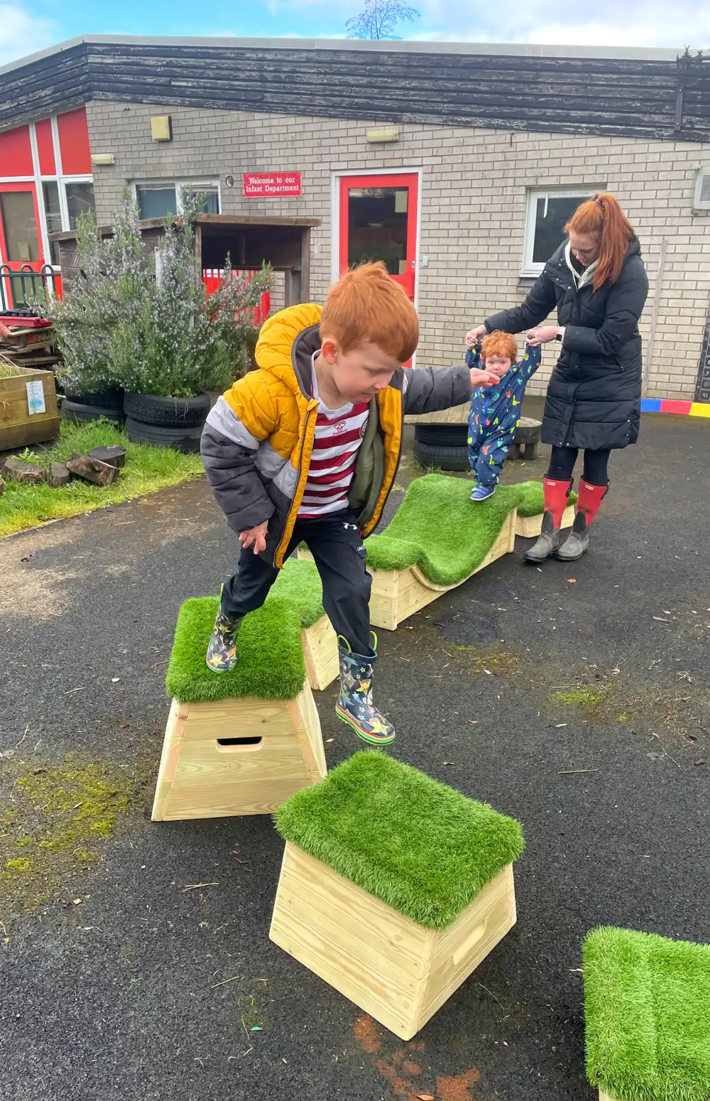 Nursery children playing on the Exercise Block Set