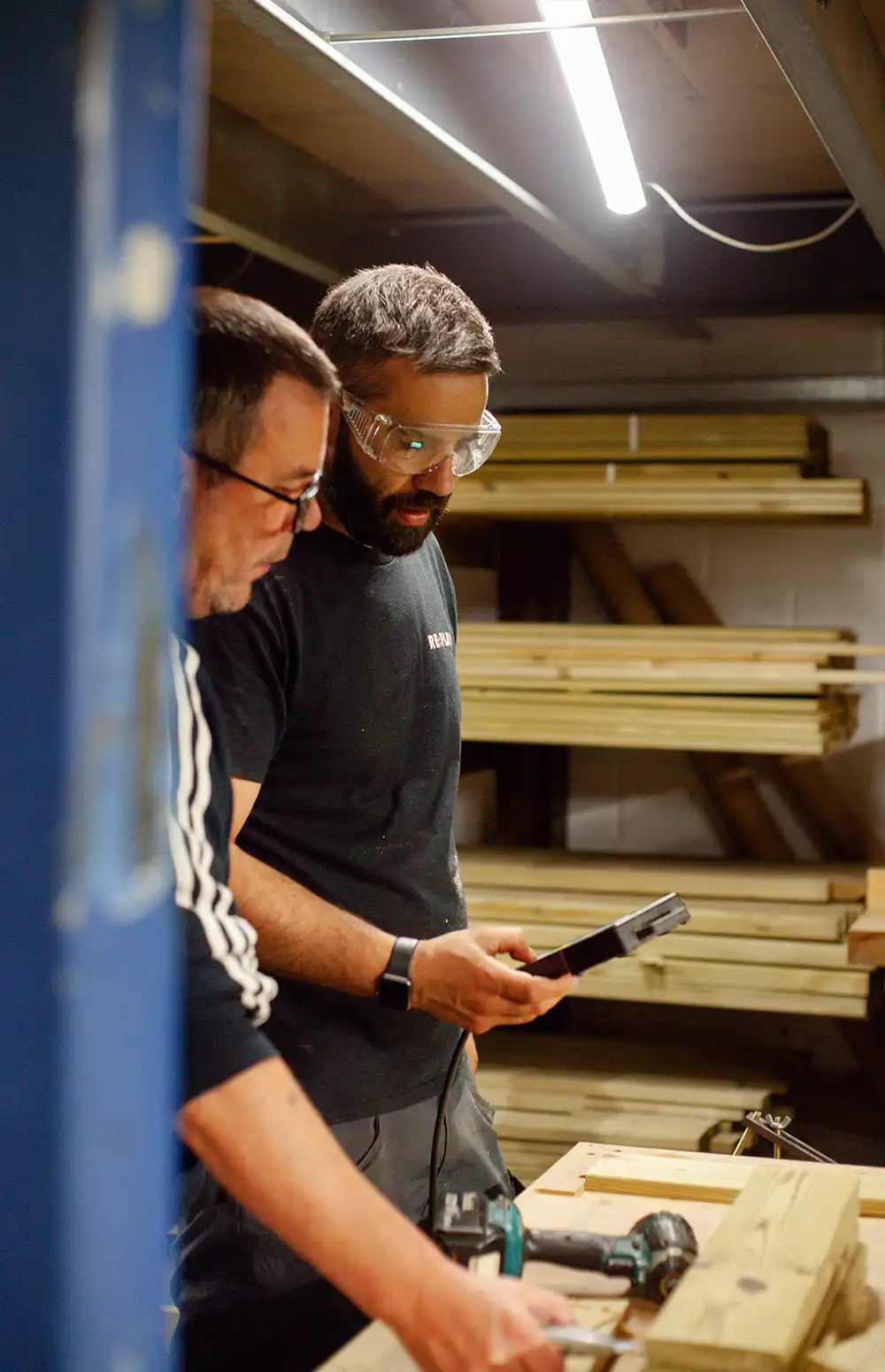 Our Warehouse Manager and assistants prepare to create playground equipment