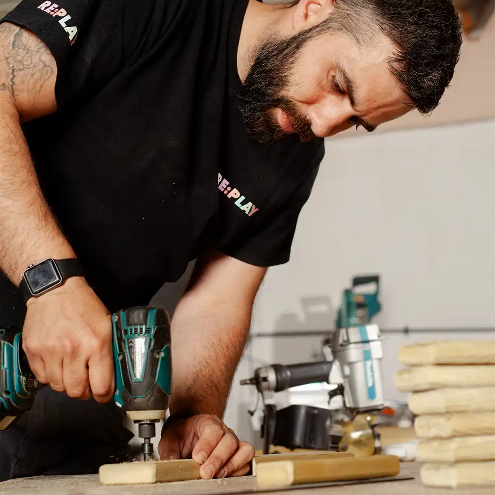 Our Warehouse Manager drilling Scandinavian Redwood