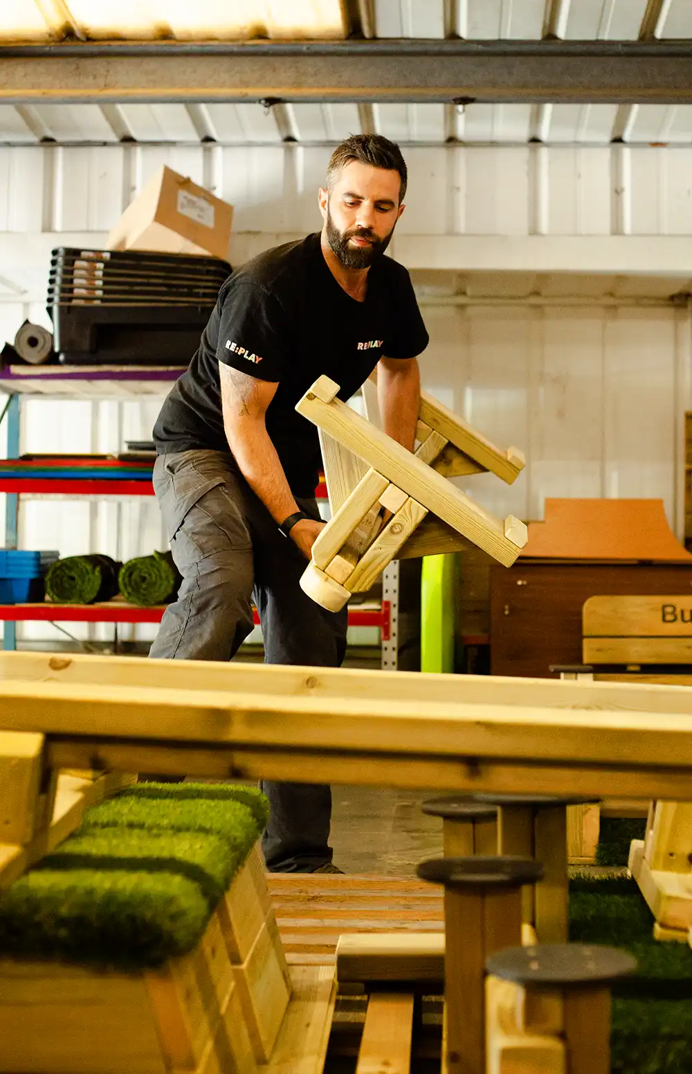 Our Warehouse Manager Packaging an Exercise Balance Set onto a pallet