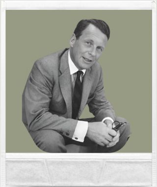 Werbetexter David Ogilvy im Anzug, Legende des klassischen Copywritings.