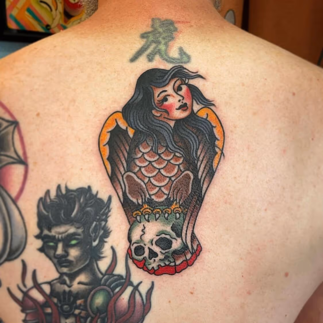 Traditional siren of Greek mythology by Brittany Quintero of Sweet Heart Tattoo.