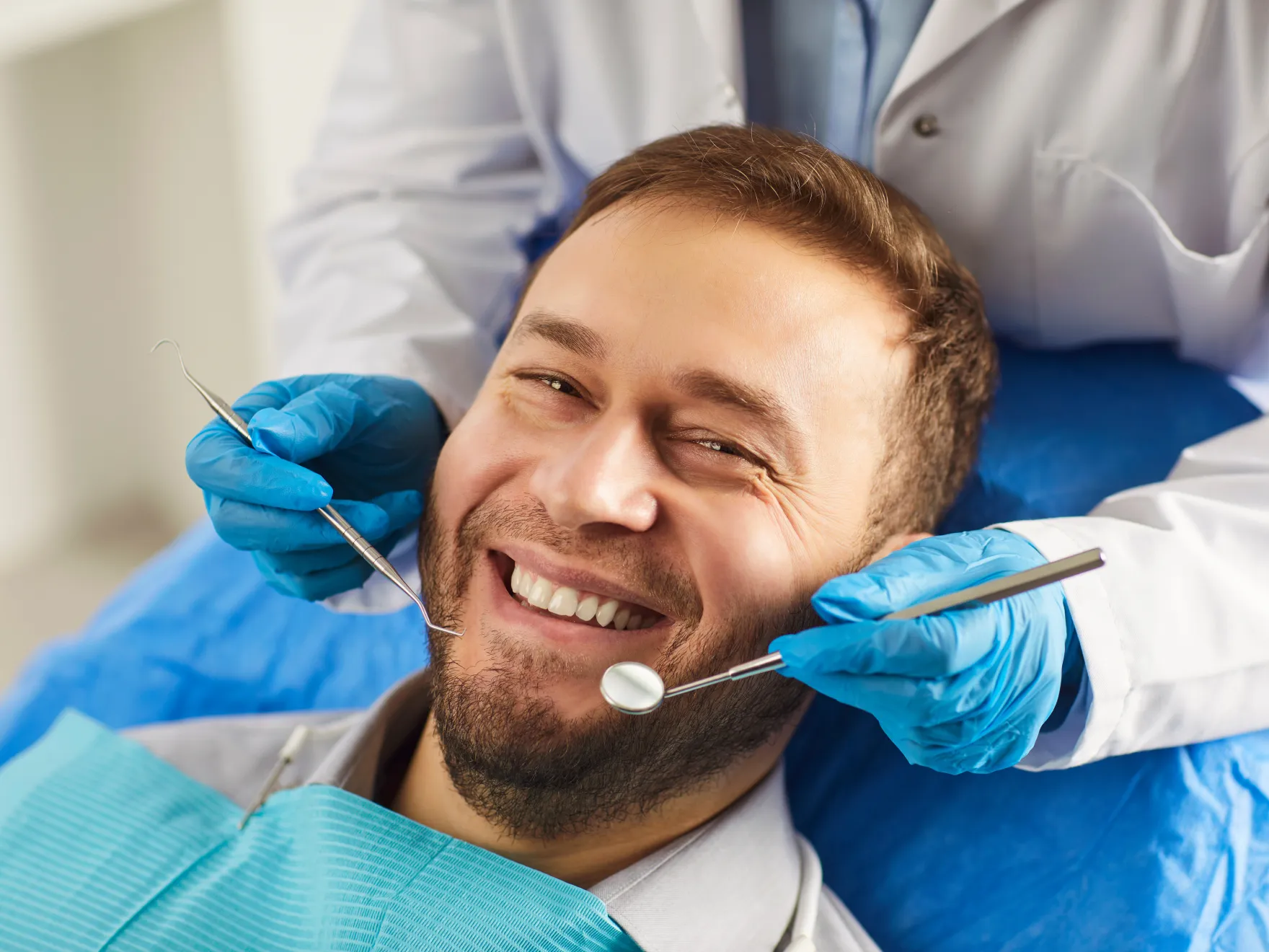 Man getting his teeth checked