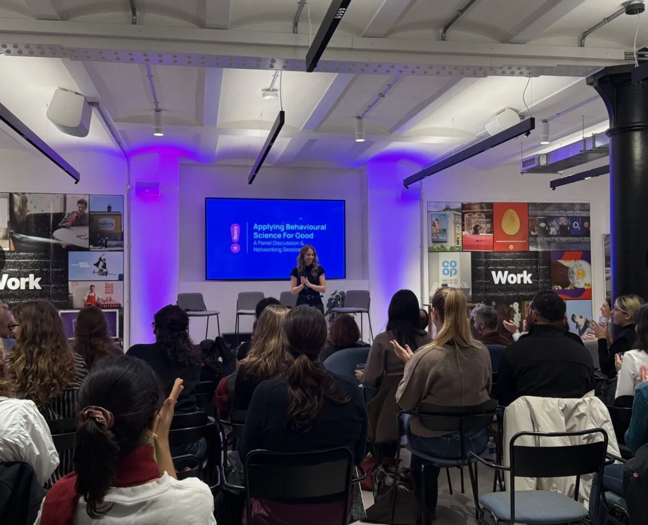A speaker addresses a seated audience at a Bescy networking session in London