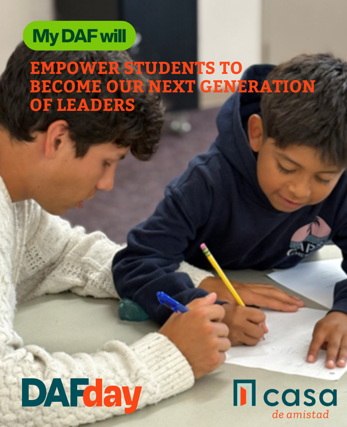 Two boys sitting at a table engaged in writing and drawing on paper, with text overlay stating My DAF will empower students to become our next generation of leaders, accompanied by the DAF day and Casa de Amistad logos.