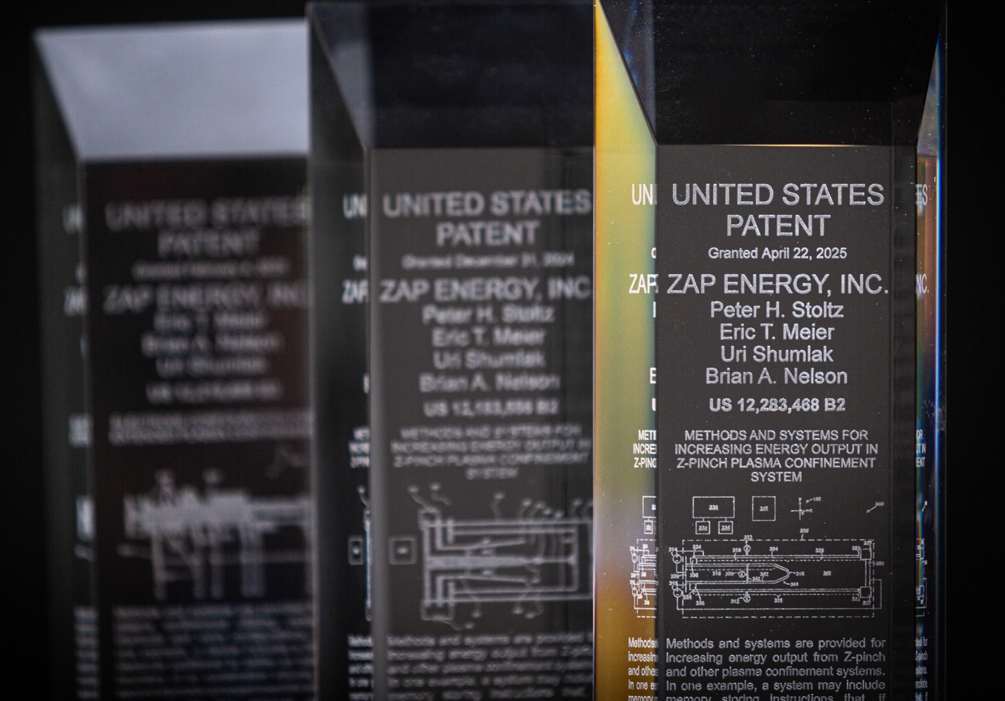 Close-up of several black and white awardsAI-generated content may be incorrect.