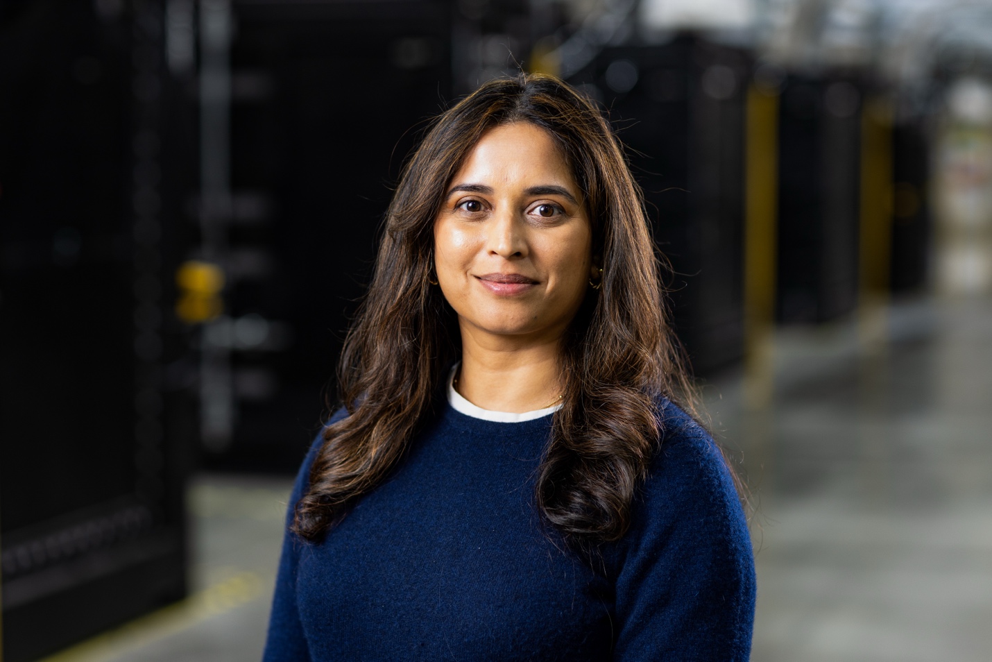 A person in a blue sweaterAI-generated content may be incorrect.