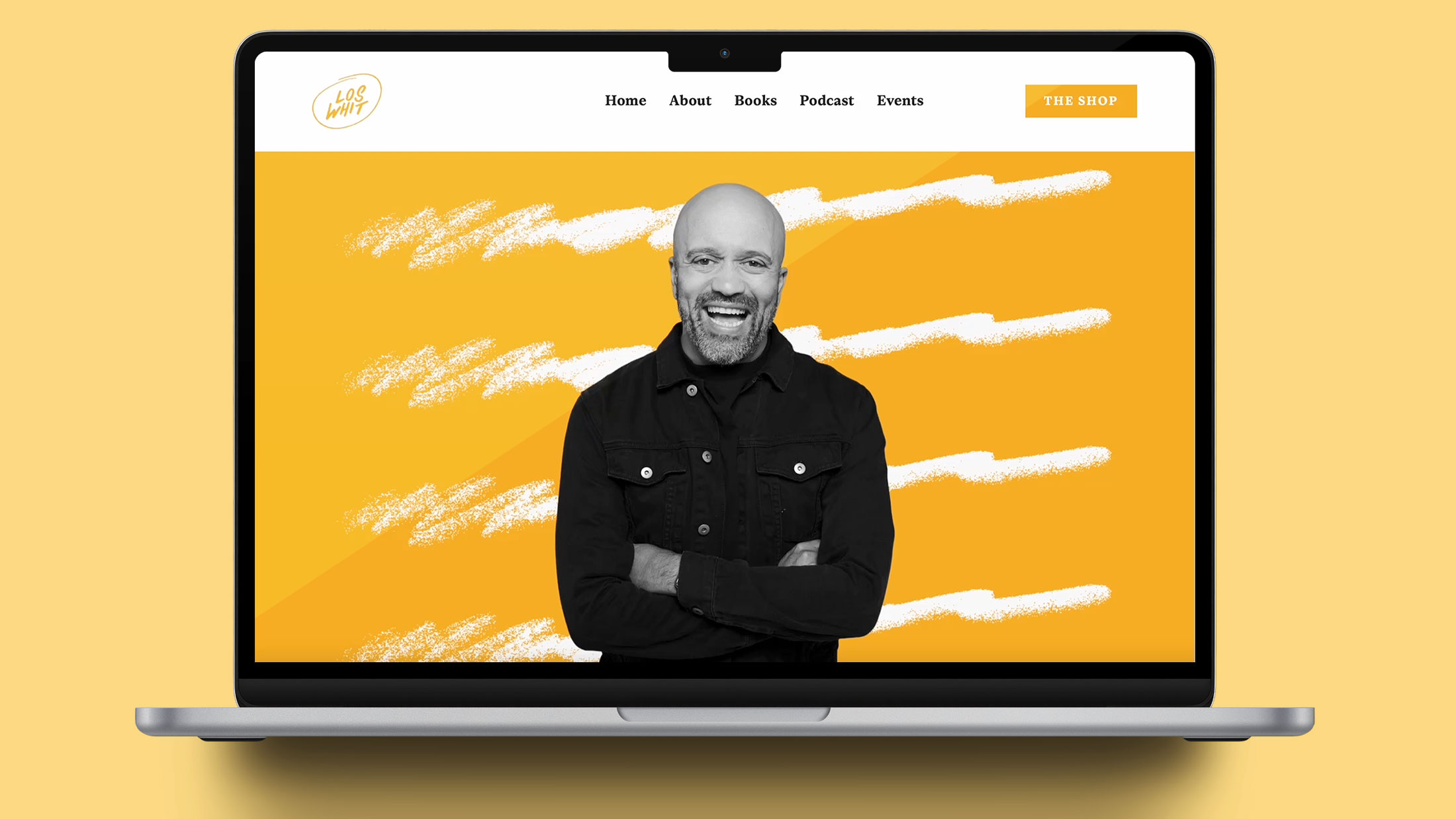 Carlos Whittaker's website shown on a laptop