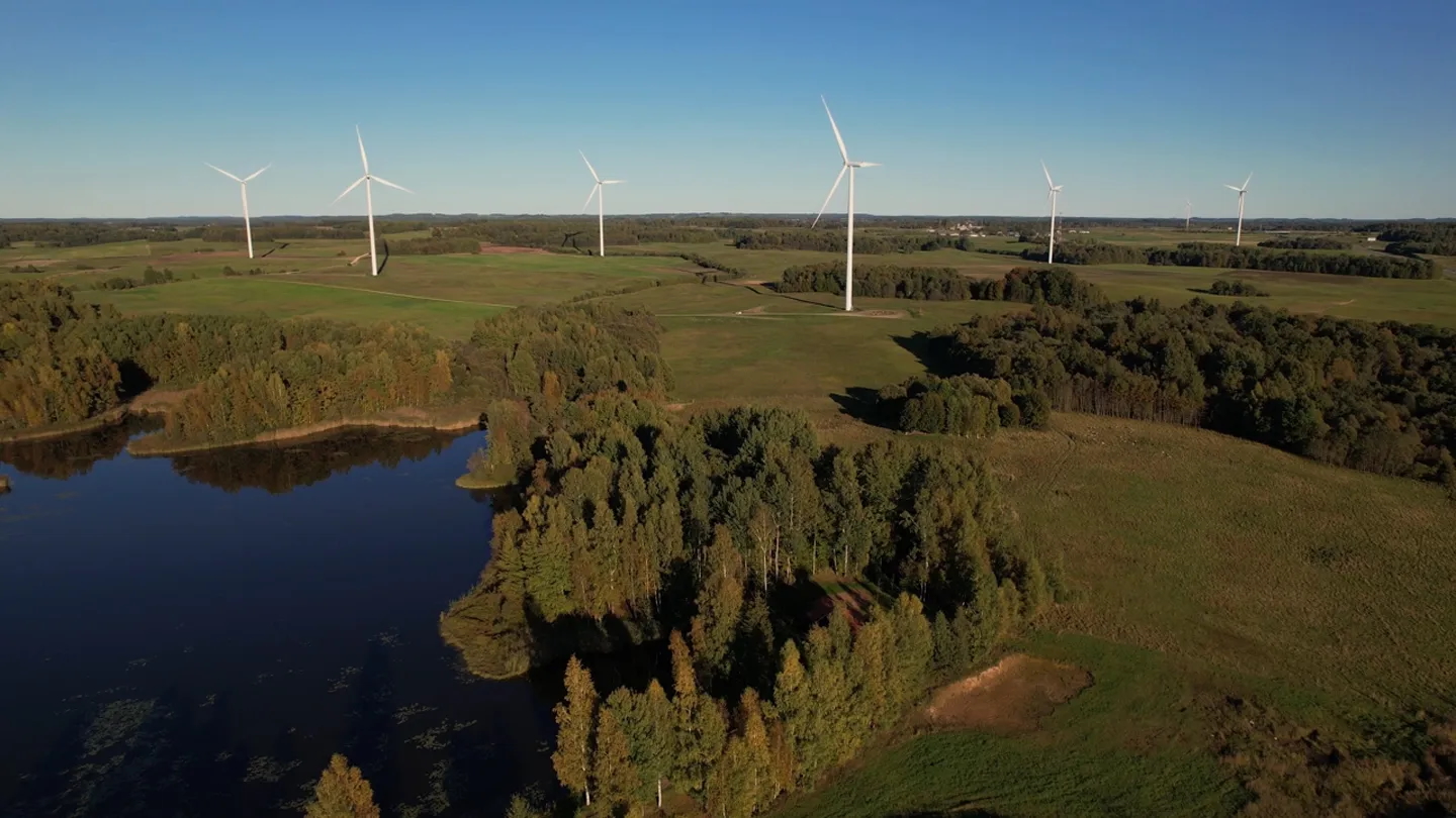 Wind turbines against a blue sky
